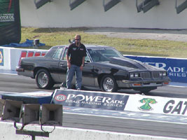 Charles Hendrickson next to Mark's Olds