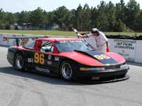Dave recieves the checkered flag