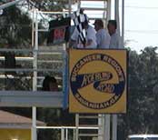 The signboard displays 96 as the winning car