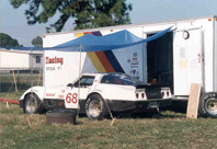 The race car by the trailer